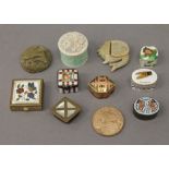 A collection of small enamel and other boxes.