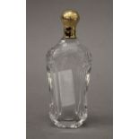 An unmarked 18 ct gold topped scent bottle. 11.5 cm high.