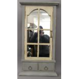A grey and white painted wall mirror. 101 cm high.