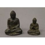 Two small bronze models of buddha. The largest 4.5 cm high.