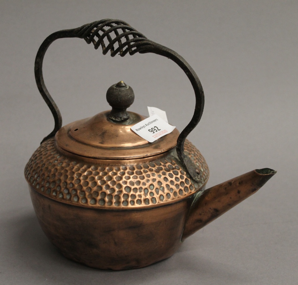 An Arts & Crafts wrought iron and copper kettle on stand. 38 cm high. - Image 3 of 4