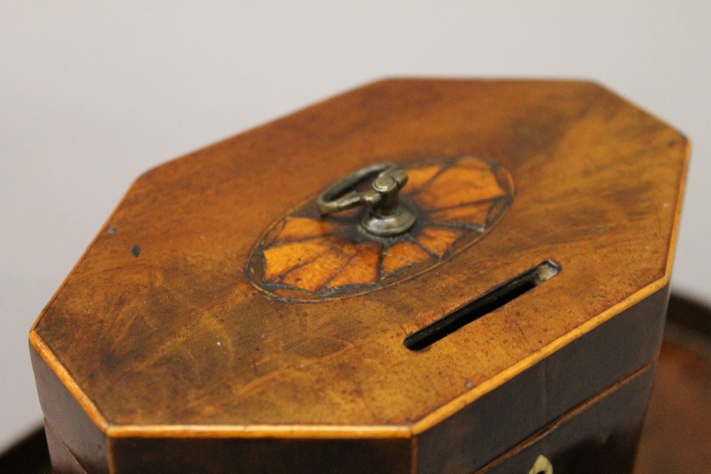 A George III mahogany octagonal tea caddy with shell inlay and a 19th century mahogany oval shell - Image 4 of 9