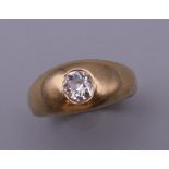 A 9 ct gold gentleman's ring, set with 0.5 carat old mine cut diamond. Ring Size N/O. 6.