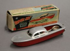 A "Super-Jet" Amazing Speed Boat toy, in original box. 16 cm long overall.