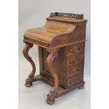 A Victorian walnut piano top Davenport. 57.5 cm wide.