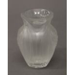 A Lalique (R) glass vase. 12 cm high.