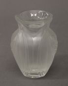 A Lalique (R) glass vase. 12 cm high.