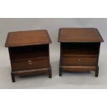 A pair of stag bedside cupboards. Each 50 cm high.