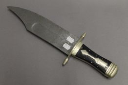 A large bowie knife, possibly a shop display model. 46 cm long.