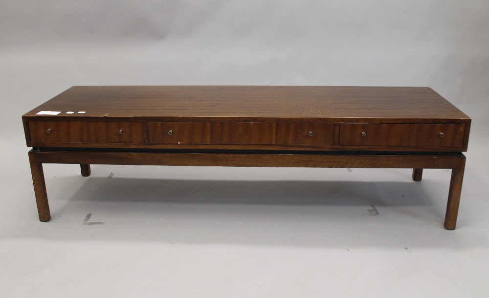 A 20th century coffee table by Greaves and Thomas. 150 cm long.