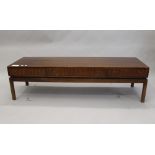 A 20th century coffee table by Greaves and Thomas. 150 cm long.