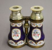A pair of 19th century enamel decorated binoculars/opera glasses. 12.5 cm wide.