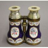 A pair of 19th century enamel decorated binoculars/opera glasses. 12.5 cm wide.