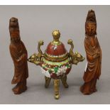 Two 19th century carved wooden figures of Guanyin and a small cloisonne gilded brass censer on