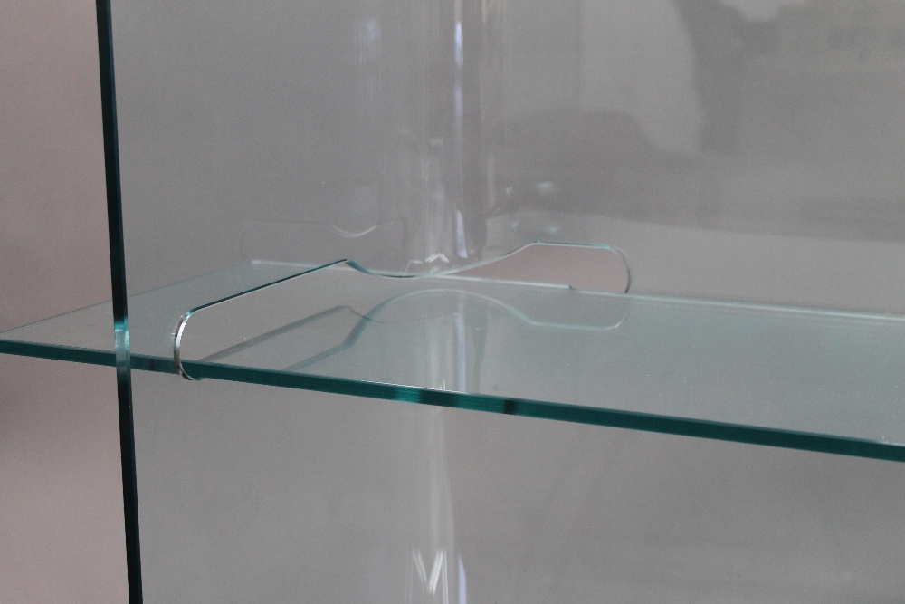 A modern glass bookcase and a modern television stand. The former 155 cm high x 120 cm wide. - Image 2 of 3