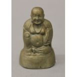 A small cast metal model of buddha. 6 cm high.