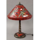 A Tiffany style lamp decorated with dragonflies. 58 cm high.