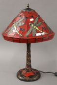 A Tiffany style lamp decorated with dragonflies. 58 cm high.