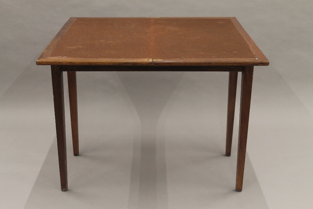 A 19th century mahogany fold over tea table. 91 cm wide. - Image 6 of 10