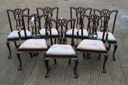 A set of seven early 20th century mahogany dining chairs, including two carvers.