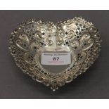 A sterling silver heart shaped dish. 11.5 cm wide. 73.3 grammes.