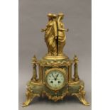 A Victorian gilt metal mounted onyx mantle clock. 50 cm high.