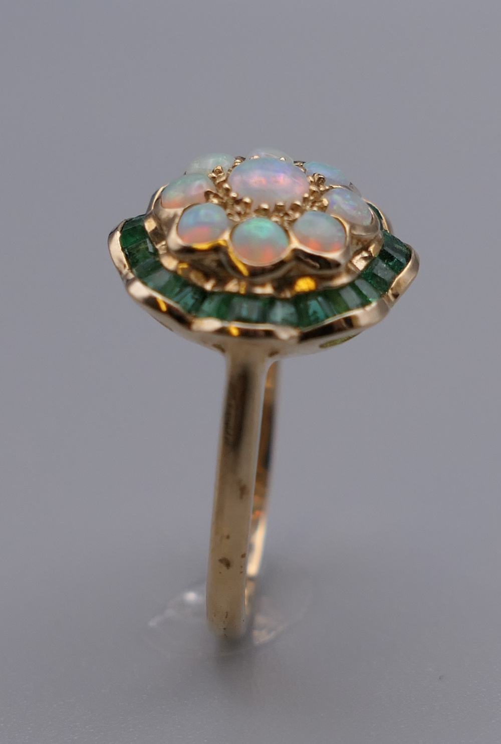 A 9 ct gold, opal and emerald ring. Ring size L/M. 2.6 grammes total weight. - Image 3 of 4