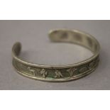 An Egyptian unmarked silver bangle. 6.5 cm wide. 22 grammes.