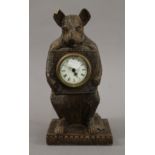 A wooden bear clock. 30 cm high.