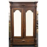 A 19th century Continental walnut armoire. 235 cm high x 160 cm wide.