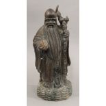 A Chinese carved hardwood model of Shou Lao. 39 cm high.