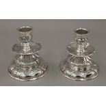 A pair of Danish silver candlesticks, makers mark AD. 9 cm high. 9.6 troy ounces.