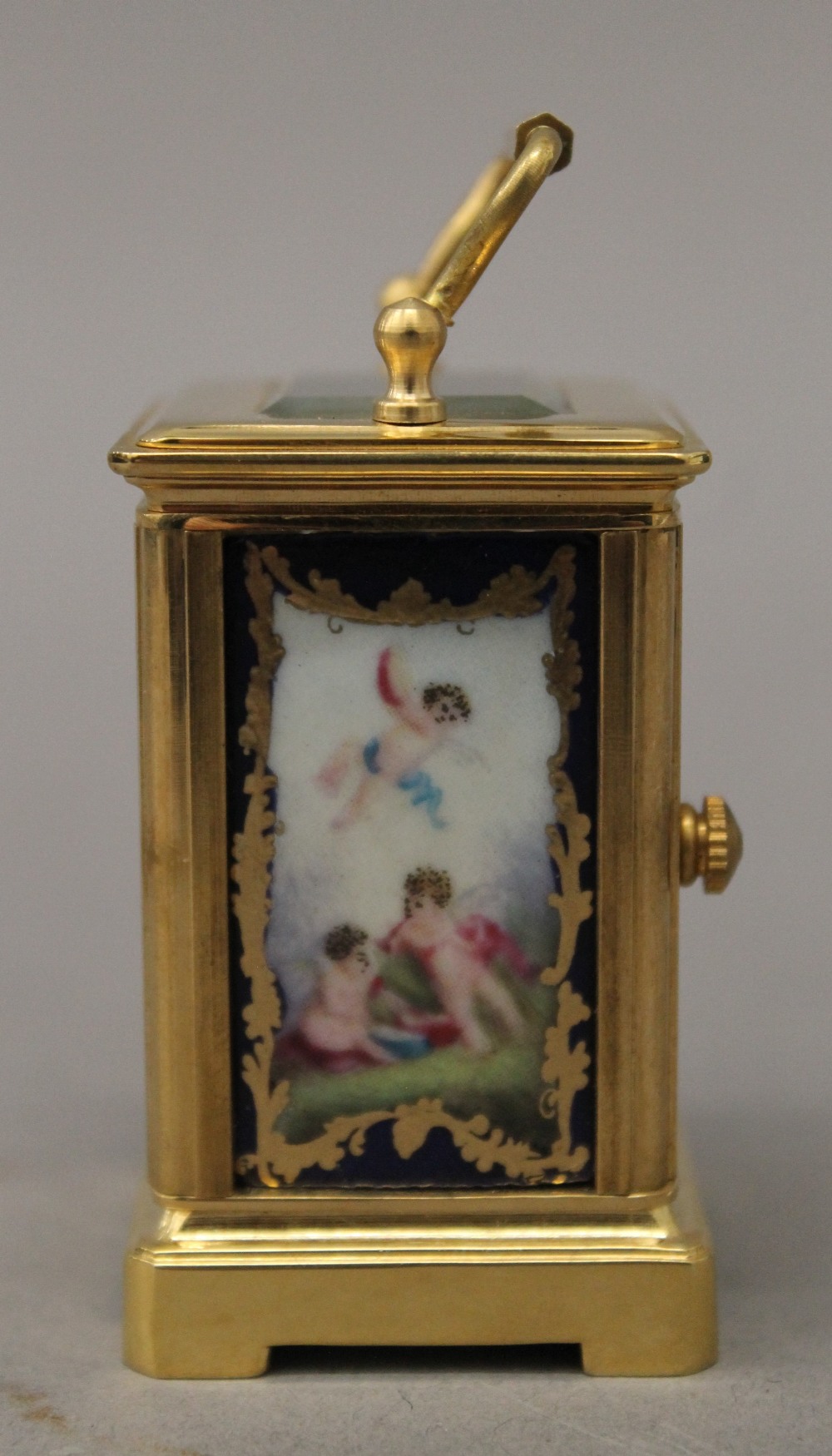 A miniature carriage clock with porcelain panels. 7.5 cm high. - Image 7 of 9
