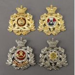 A quantity of military badges.
