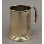 A small silver mug. 7 cm high. 2.3 troy ounces.