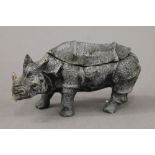 A cold painted bronze rhino inkwell. 15.5 cm long.