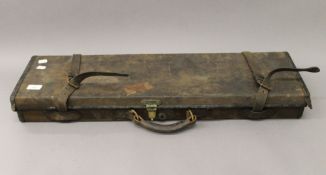 A Victorian gun case a Boss & Co 13 Dover Street Piccadilly London label to the interior.