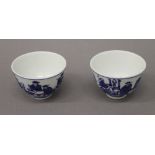 A pair of Chinese blue and white porcelain wine cups. 6.5 cm diameter.