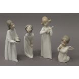 Four Lladro figurines. The largest 20 cm high.