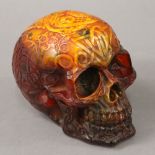 A model of a skull. 13 cm high, 16 cm long, 11 cm wide.