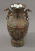 A Chinese archaic style bronze vase. 31 cm high.