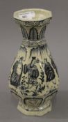 A Chinese blue and white porcelain vase decorated with people. 28 cm high.