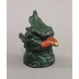 A cold painted bronze inkwell in the form of a parrot. 8.5 cm high.