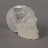 A rock crystal skull. 8 cm high.