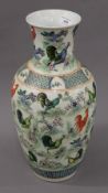 A Chinese porcelain vase decorated with cockerels. 43 cm high.