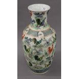 A Chinese porcelain vase decorated with cockerels. 43 cm high.