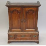 An 18th century, possibly Colonial/American walnut table cabinet. 77 cm high x 58 cm wide.