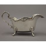 A silver sauce boat. 16.5 cm long. 6.1 troy ounces.