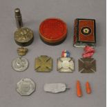 A bag of miscellaneous items, including medals, corals, etc.