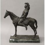 A bronze model of an Native American Indian on horseback. 46 cm high.